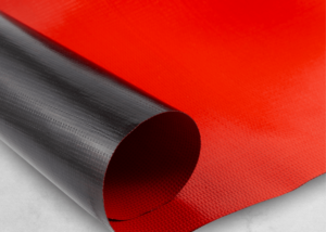 Image of Armor Fabric™ with the red side of the material face up, and the black side rolled over.